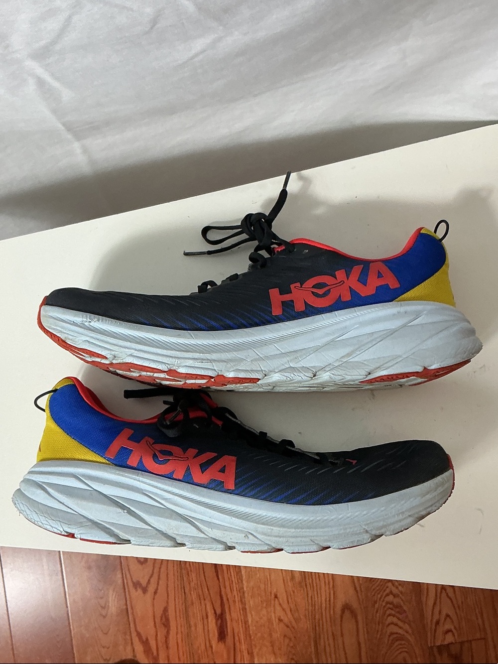 Hoka Men’s Rincon 3 Black Running Shoes with Red and Blue Accents - Picture 3 of 12